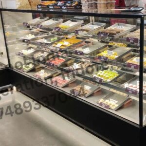 It is a Steel display counter used to display mawa sweets, mithai, dry fruits, cookies, and snacks in bakeries, sweet shops.