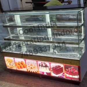 It is Display counter made of SS, bend glass, and LED lights used in sweet shops and bakeries for displaying bengali sweets.